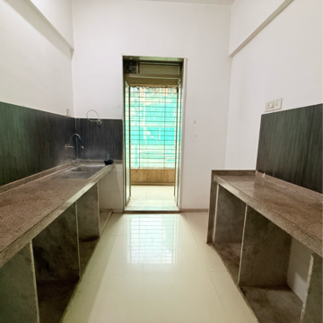 Kitchen in 1 BHK Apartment at Morya Garden Residency, Vichumbe – for Rent
