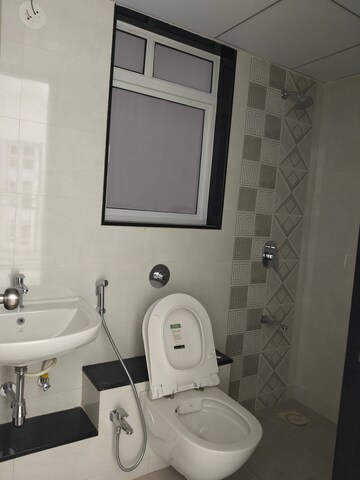Bathroom in 3 BHK Apartment at Jhamtani Ace Abode, Kiwale – for Rent