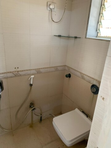 Bathroom in 2 BHK Apartment at Oakland Park, Andheri West – for Sale