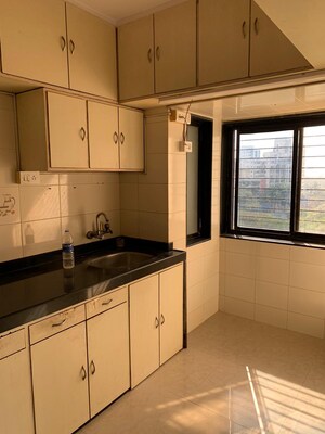 Kitchen in 2 BHK Apartment at Oakland Park, Andheri West – for Sale