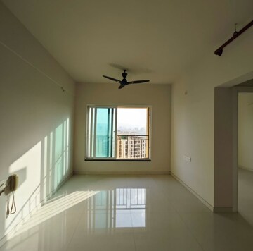 Room in 2 BHK Apartment at Rustomjee Urbania Azziano, Thane West – for Rent
