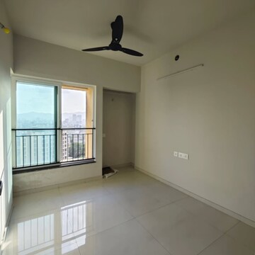 Room in 2 BHK Apartment at Rustomjee Urbania Azziano, Thane West – for Rent
