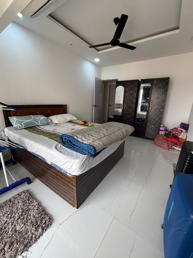 Bedroom, four bunglows 3 Bedroom 1000 Sq.Ft. Apartment In Four Bunglows Mumbai 9052399