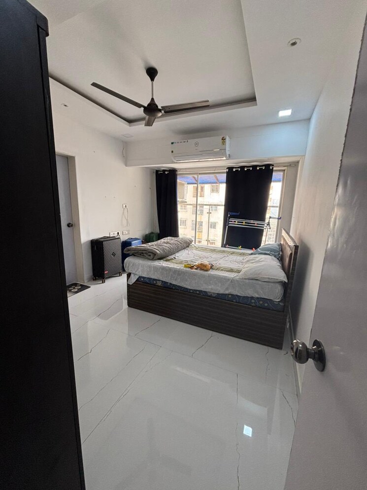 Bedroom, four bunglows 3 Bedroom 1000 Sq.Ft. Apartment In Four Bunglows Mumbai 9052399