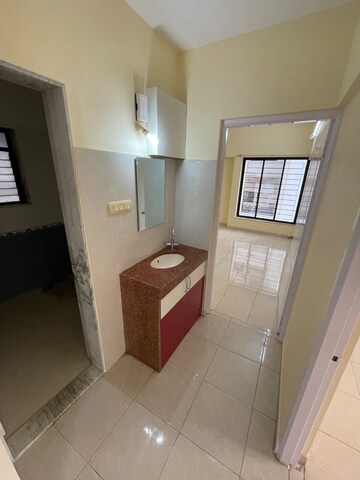Kitchen in 2 BHK Apartment at Rohan Garima Phase II, Model Colony – for Rent