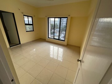 Room in 2 BHK Apartment at Rohan Garima Phase II, Model Colony – for Rent