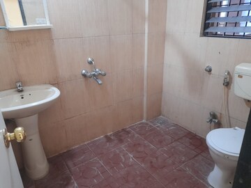 Bathroom in 1 BHK Apartment at Gulmohar Symphony, Kharadi – for Rent
