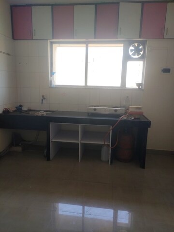 Kitchen in 1 BHK Apartment at Gulmohar Symphony, Kharadi – for Rent