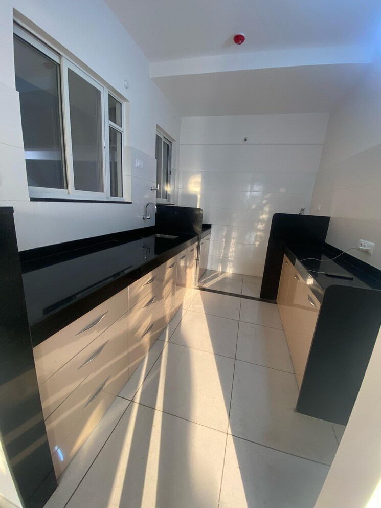 Kitchen, vj-yashone-infinitee 2 Bedroom 1027 Sq.Ft. Apartment In Tathawade Pune 9052453