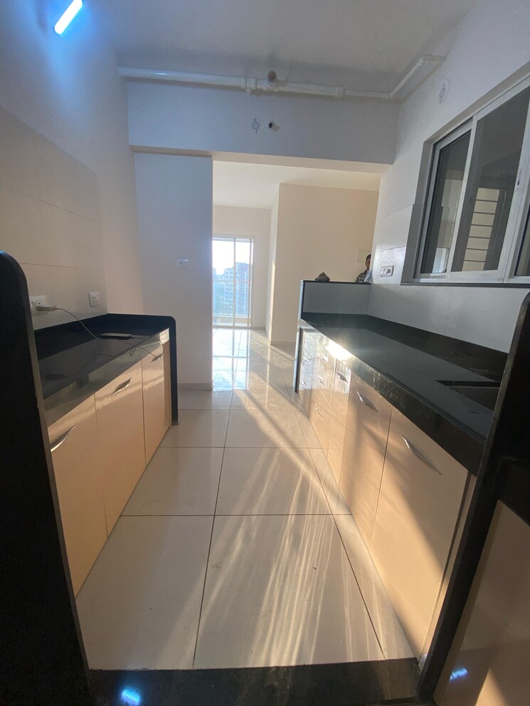 Kitchen, vj-yashone-infinitee 2 Bedroom 1027 Sq.Ft. Apartment In Tathawade Pune 9052453