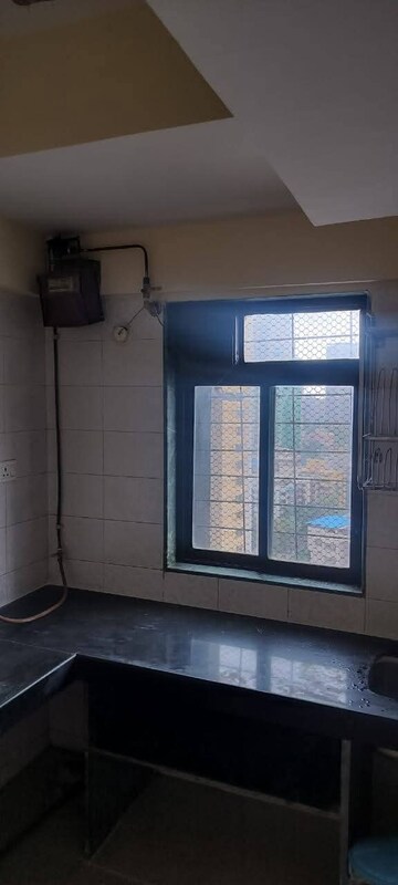 Room in 1 BHK Apartment at Sanjay Gandhi Nagar CHS, Malad East – for Rent