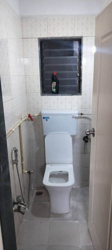 Bathroom in 1 BHK Apartment at Sanjay Gandhi Nagar CHS, Malad East – for Rent