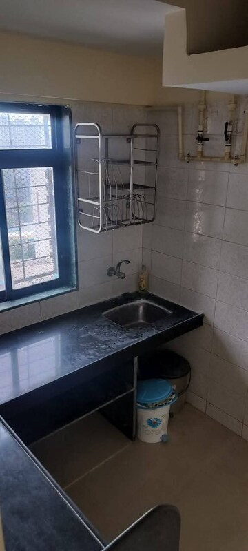 Kitchen in 1 BHK Apartment at Sanjay Gandhi Nagar CHS, Malad East – for Rent
