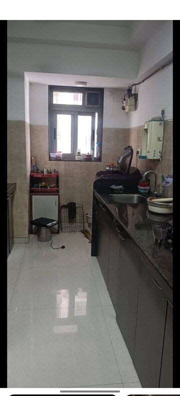 Kitchen in 3 BHK Apartment at Adani Western Heights Sky Apartments, Andheri West – for Rent