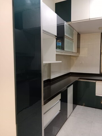 Kitchen in 2.5 BHK Apartment at Siddhachal Apartment 8, Vasant Vihar – for Rent