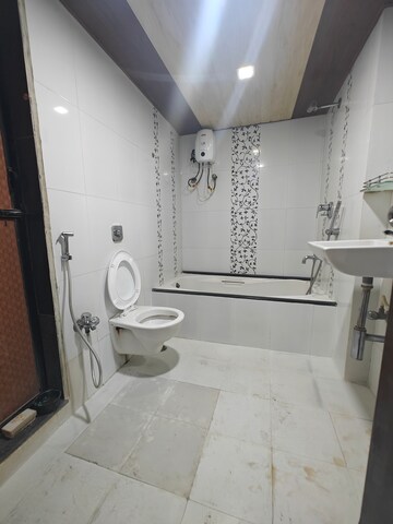 Bathroom in 2 BHK Apartment at Gahlot Majesty and Avenue CHS, Seawoods – for Rent