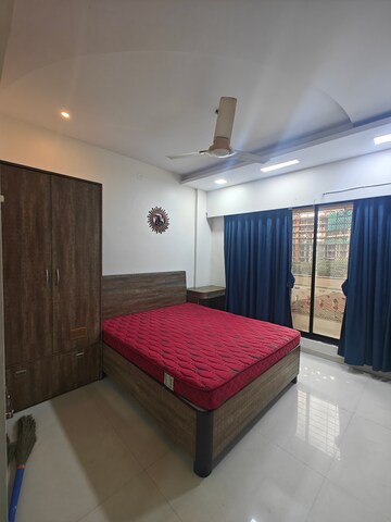 Bedroom in 2 BHK Apartment at Gahlot Majesty and Avenue CHS, Seawoods – for Rent