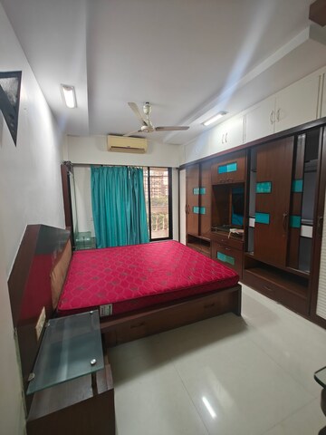 Bedroom in 2 BHK Apartment at Gahlot Majesty and Avenue CHS, Seawoods – for Rent