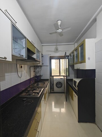 Kitchen in 2 BHK Apartment at Gahlot Majesty and Avenue CHS, Seawoods – for Rent