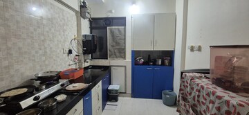 Kitchen in 1 BHK Apartment at Rosa Gardenia, Ghodbunder Road – for Rent