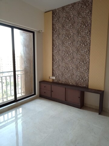 Room in 2 BHK Apartment at Harmony Signature Towers, Owale – for Rent