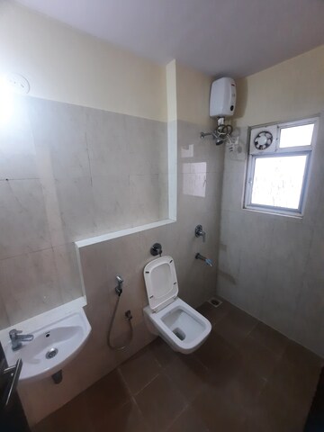 Bathroom in 1 BHK Apartment at Puranik Hometown Phase II, Ghodbunder Road – for Rent