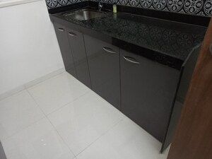 Kitchen in 1 BHK Apartment at Lodha Amara, Kolshet Road – for Sale