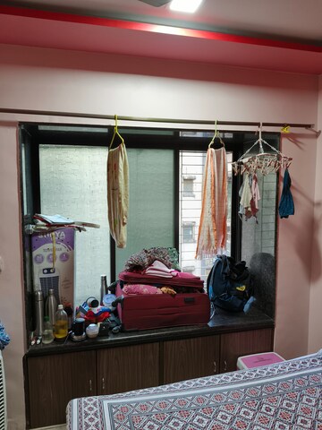 Bedroom in 3 BHK Apartment at Sivneri CHS, Malad West – for Rent