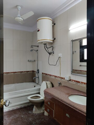 Bathroom in 4 BHK Builder Floor at Boutique Residential Apartments A 3 2, Vasant Vihar – for Rent
