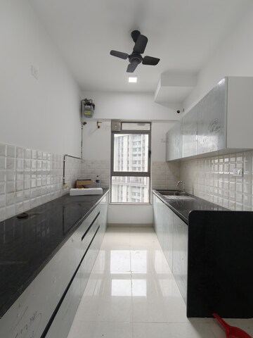 Kitchen in 2 BHK Apartment at Kalpataru Immensa, Kolshet Road – for Rent