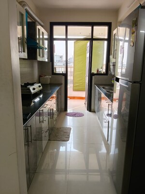 Kitchen in 3 BHK Apartment at Golden Sand Apartments, Dhakoli – for Sale