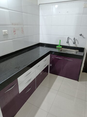 Kitchen in 2 BHK Apartment at Tulip Infinity Planet, Moshi – for Rent