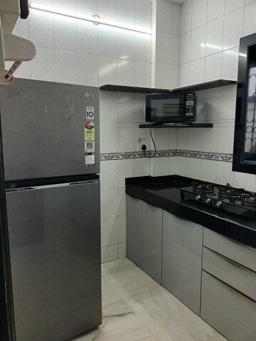 Kitchen in 2 BHK Apartment at Lok Raunak B CHS, Marol – for Rent