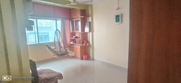 Living Room in 2 BHK Apartment at Woodland Avenue, Kothrud – for Rent