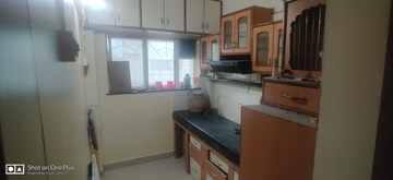 Kitchen in 2 BHK Apartment at Woodland Avenue, Kothrud – for Rent