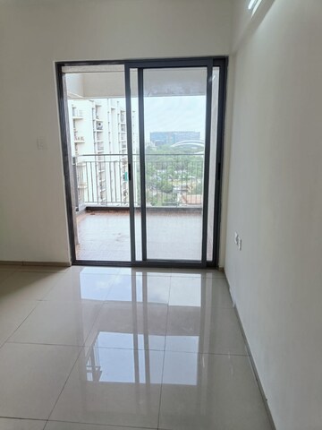 Master Bedroom in 2 BHK Apartment at Saarrthi Skybay, Mahalunge – for Rent
