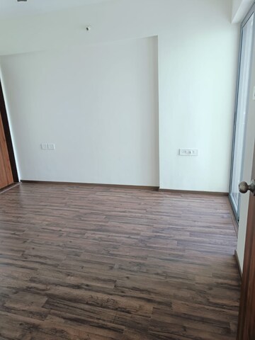 Room in 2 BHK Apartment at Saarrthi Skybay, Mahalunge – for Rent