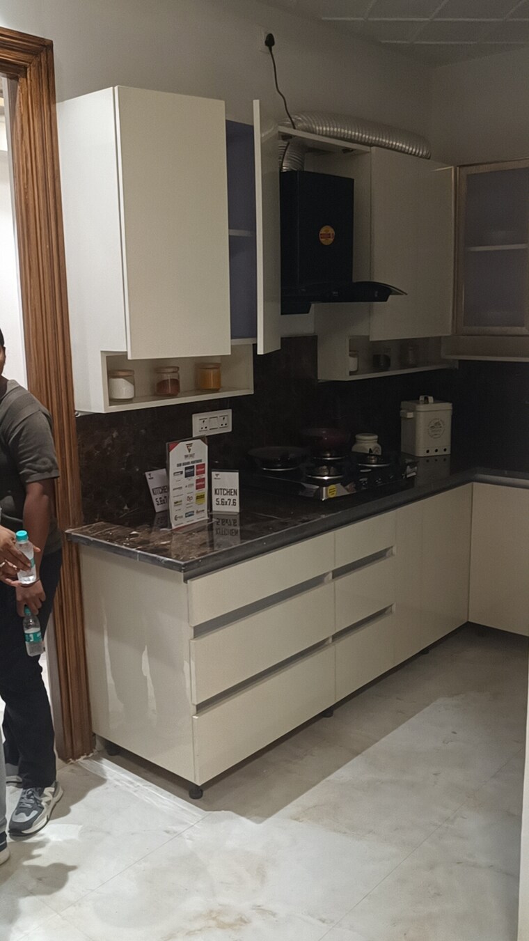 Kitchen, ambesten-twin-county 2.5 Bedroom 935 Sq.Ft. Builder Floor In Sector 1 Greater Noida Greater Noida 9053408