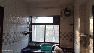 Kitchen in 1 BHK Apartment at Tilak Bhavana CHS, Tilak Nagar – for Rent