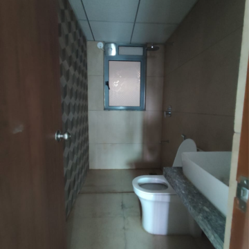 Bathroom in 2 BHK Apartment at Raymond Ten X Habitat, Swastik Garden – for Rent