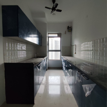 Kitchen in 2 BHK Apartment at Raymond Ten X Habitat, Swastik Garden – for Rent