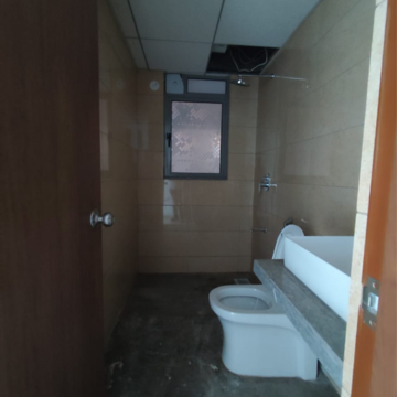 Bathroom in 2 BHK Apartment at Raymond Ten X Habitat, Swastik Garden – for Rent