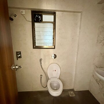 Bathroom in 2 BHK Apartment at Raymond Ten X Habitat, Swastik Garden – for Rent