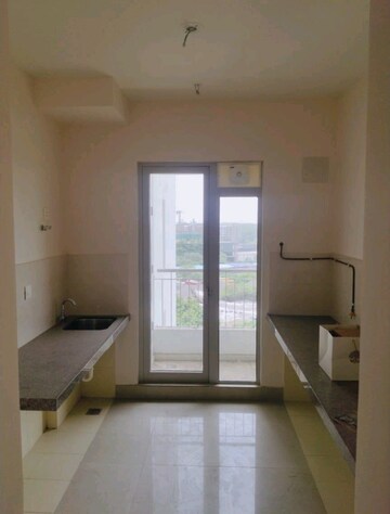 Kitchen in 2 BHK Apartment at Piramal Vaikunth, Balkum Pada – for Rent