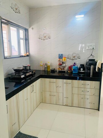 Kitchen in 2 BHK Apartment at Mohannagar CHS, Baner – for Rent