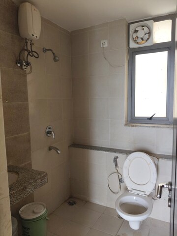 Bathroom in 2 BHK Apartment at Unitech Uniworld Gardens 2, Sector 47 – for Rent