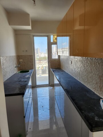 Kitchen in 2 BHK Apartment at Signature The Millennia 2, Sector 37d – for Rent