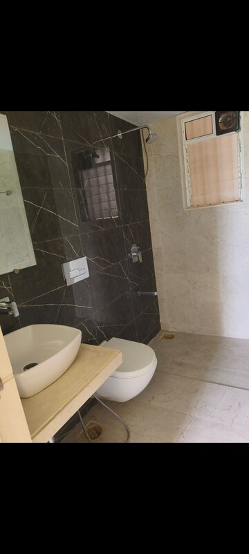 Bathroom in 1.5 BHK Apartment at Dosti West County, Balkum Pada – for Rent