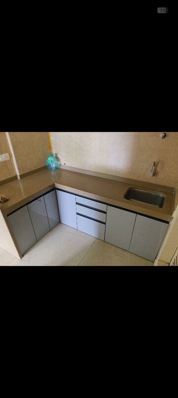 Kitchen in 1.5 BHK Apartment at Dosti West County, Balkum Pada – for Rent