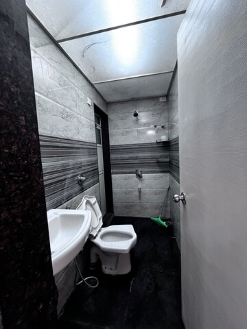 Bathroom in 2 BHK Apartment at Hyde Park CHS, Kharghar – for Rent